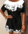 Kadın Tek Omuzu Açık çiçek Desenli Beli Kuşaklı Iki Iplik Mini Short Tulum