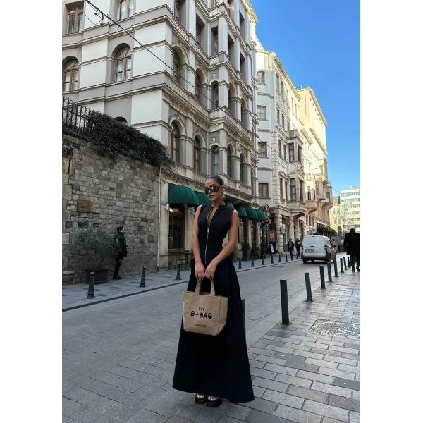 Dik Yuvarlak Yaka Önden Fermuarlı Sifir Kol Beli Oturtmalı Kolsuz Cepli Çan Etekli Uzun Elbise - Siyah