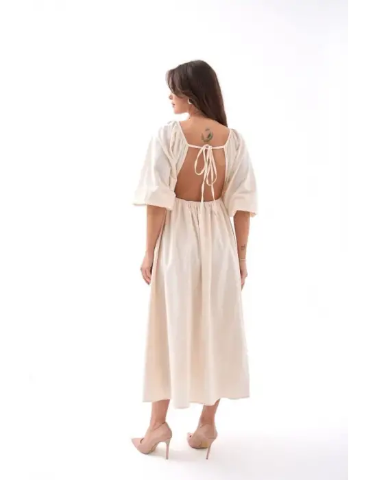 Omarı Modern Çizgilerle İşlevsel Bej Elbise