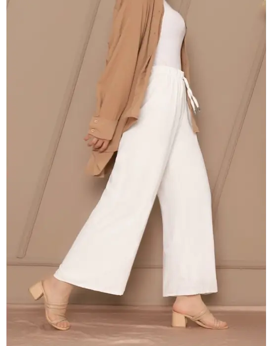 Omarı Bol Paça Beli Lastikli Beyaz Pantolon