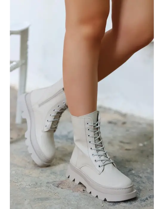 Omarı Yüksek Konfor ve Tarzın Buluştuğu Bej Bot