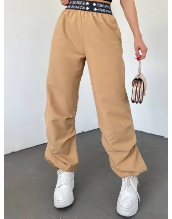 Omarı Esnek Beli ve Rahat Kesimiyle Lastikli Paçası Pantolon - Vizon