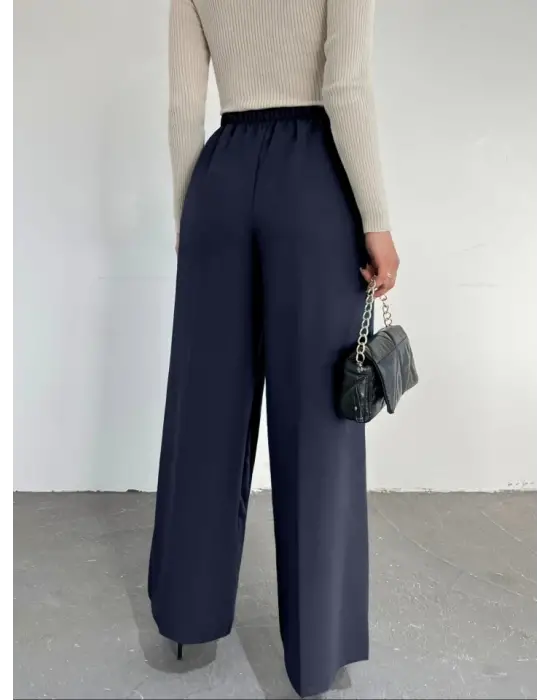 Omarı Rahatlık ve Şıklığı Bir Arada Sunan Bol Paça Pantolon