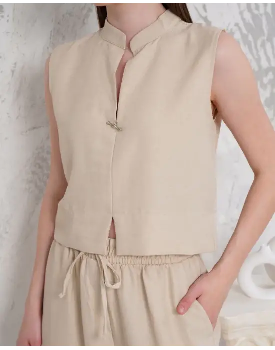 Broşlu yelek pantolon takım bej s255821