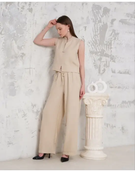 Broşlu yelek pantolon takım bej s255821