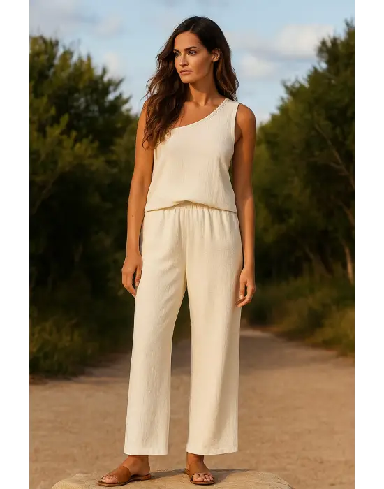 Omarı Şık Tek Omuzlu Beyaz Bluz ve Geniş Paça Pantolon Takımı