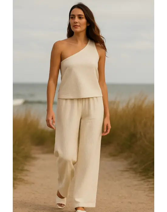 Omarı Şık Tek Omuzlu Beyaz Bluz ve Geniş Paça Pantolon Takımı