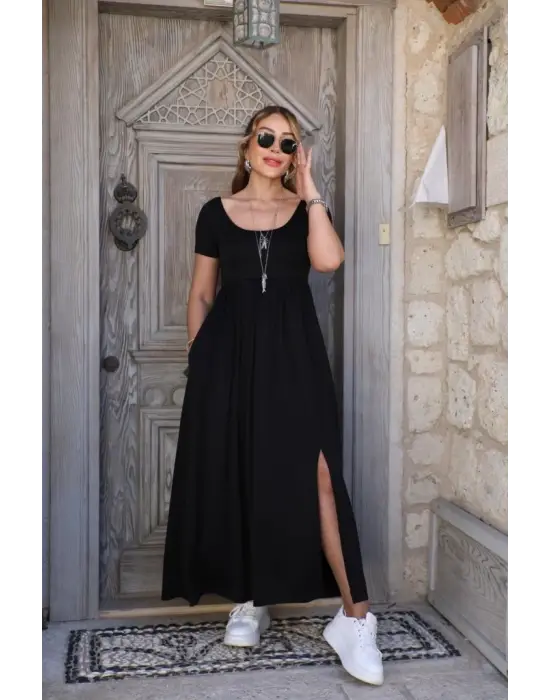 Omarı Sade ve Şık Kadın Elbisesi Önden Yırtmaç Detaylı