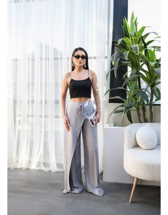 Keten Önü Çapraz Parçali Lasti̇kli̇ Ve Bağcikli Geni̇ş Paça Pantolon