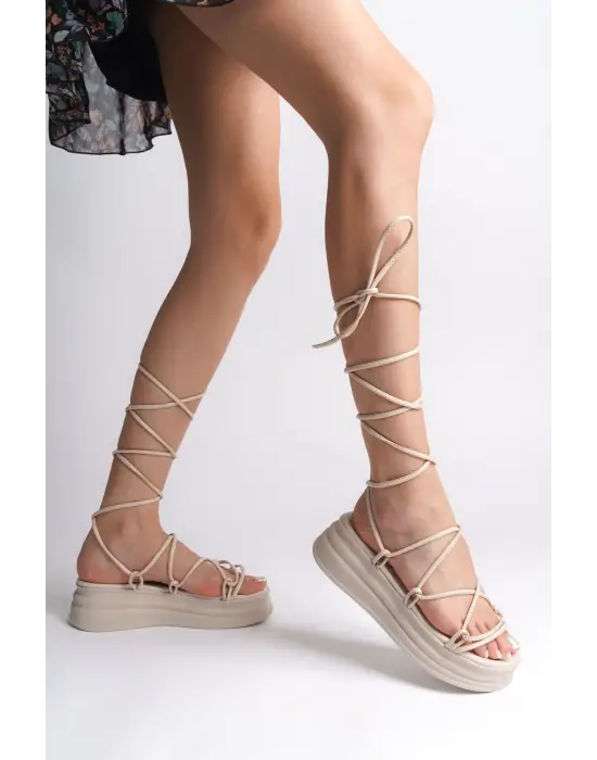 Omarı Rahat Tabanlı Bilekten Bağlamalı Topuklu Bayan Terlik - Krem