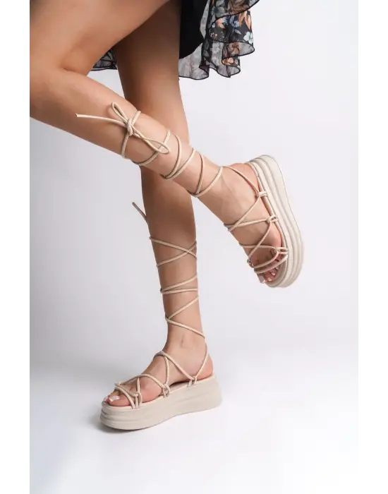 Omarı Rahat Tabanlı Bilekten Bağlamalı Topuklu Bayan Terlik - Krem