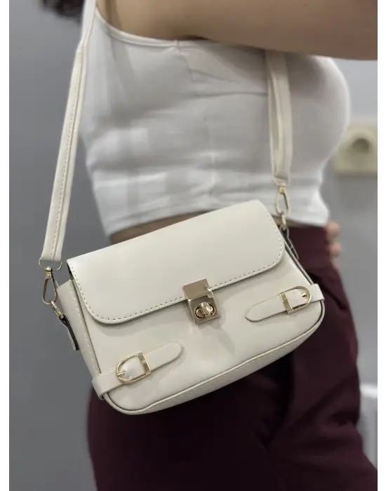 Omarı İnce deri kemerli krem çanta