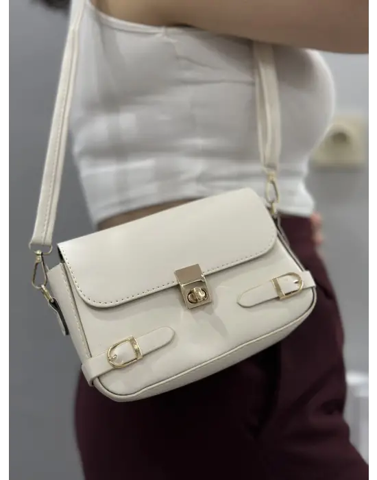 Omarı İnce deri kemerli krem çanta