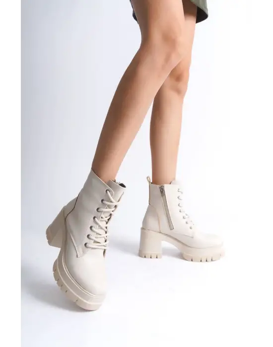 Omarı Kahve Rengi Fermuarlı Rahat Topuklu Bot