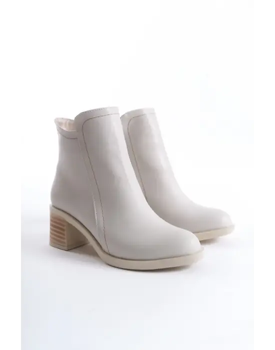 Omarı Rahat ve Şık Yüksek Topuklu Krem Bot