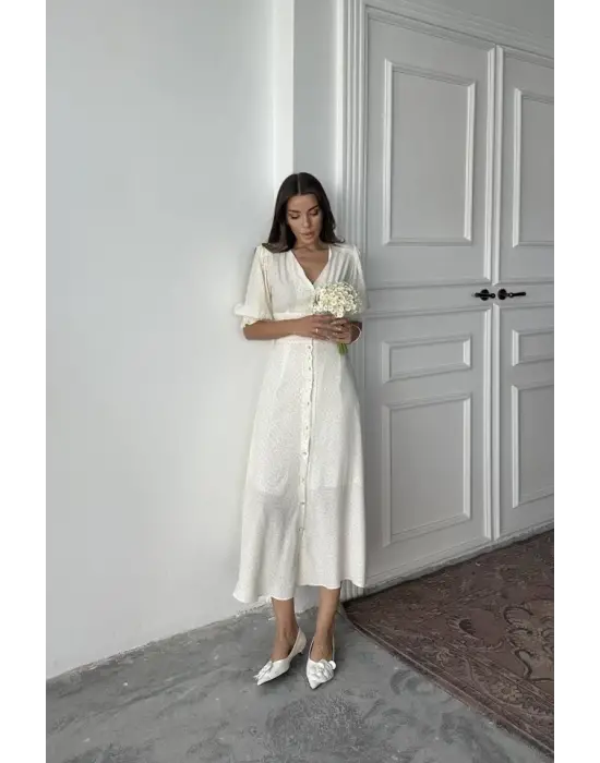 Omarı Sarı Elbise Arka Ve Bel Detaylarıyla Öne Çıkıyor