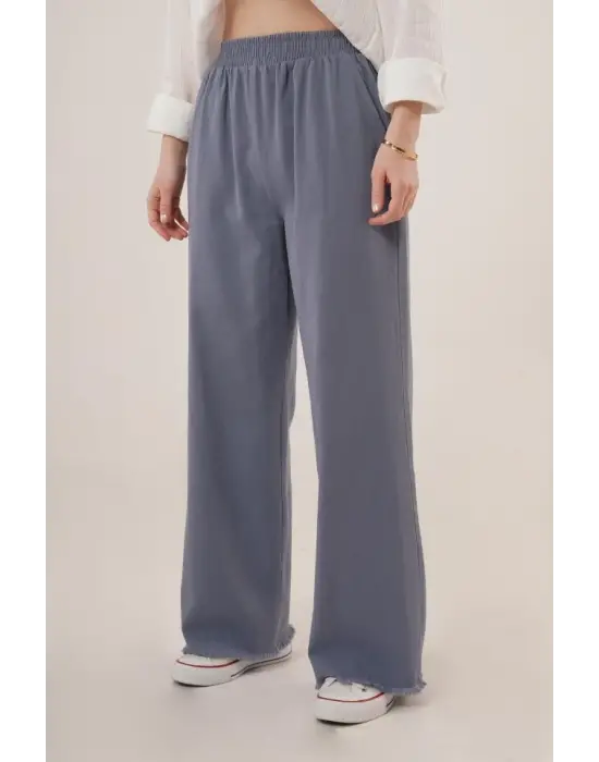 Omarı Bel Lastikli Paça Detaylarıyla Şık İndigo Pantolon