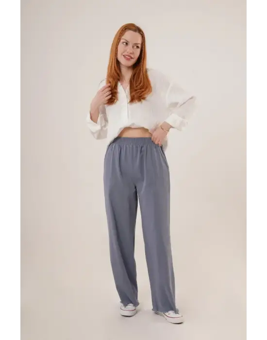 Omarı Bel Lastikli Paça Detaylarıyla Şık İndigo Pantolon