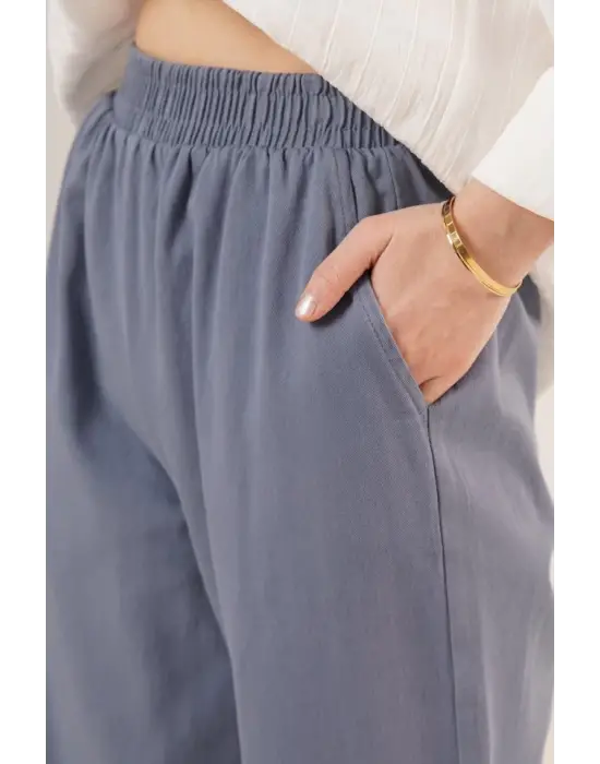 Omarı Bel Lastikli Paça Detaylarıyla Şık İndigo Pantolon