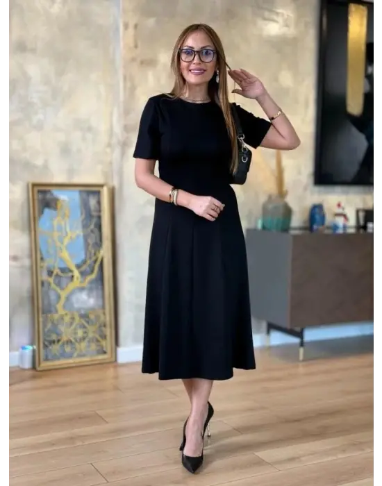 Omarı Rahat Ve Şık Kadın Midi Elbise