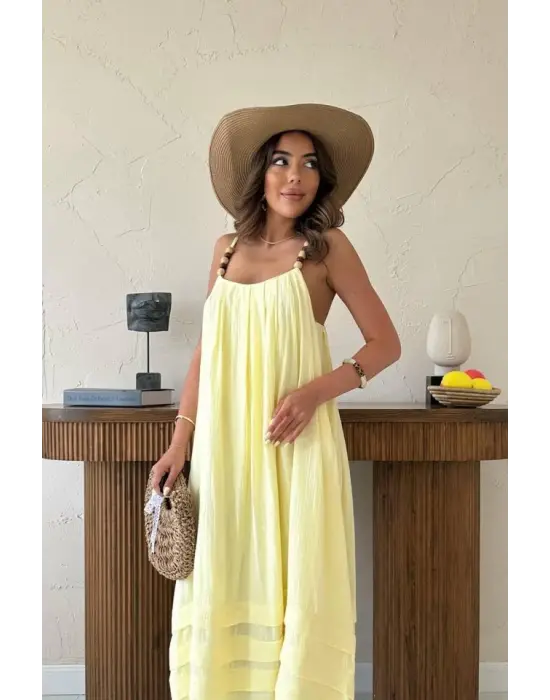 Omarı Hafif ve Şık Sarı Müslin Elbise