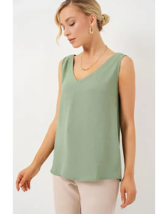 V Yaka Sıfır Kol Bluz 950 - Çağla