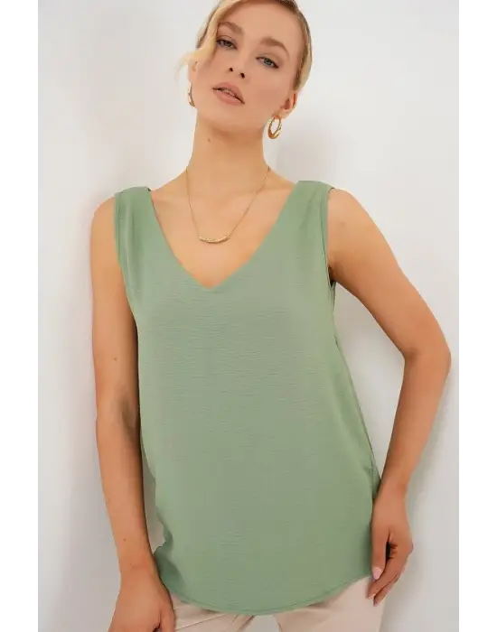 V Yaka Sıfır Kol Bluz 950 - Çağla