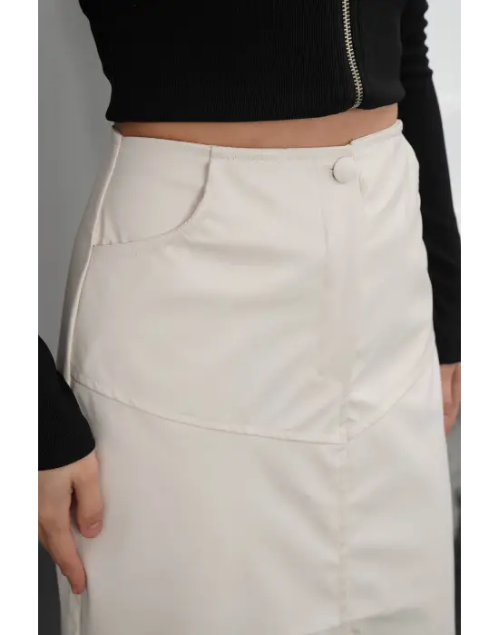 Yırtmaçlı uzun deri etek krem