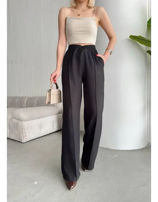 Omarı Rahat ve Trend Beli Çapraz Pantolon