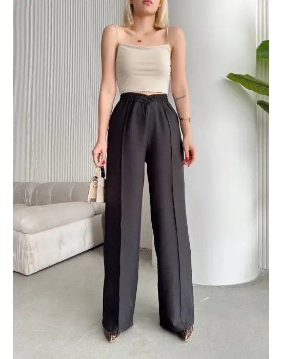 Omarı Rahat ve Trend Beli Çapraz Pantolon
