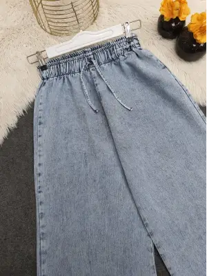 Bol Paça Beli Lastikli Bağcık Detaylı Kot Pantolon      -Buz Mavi