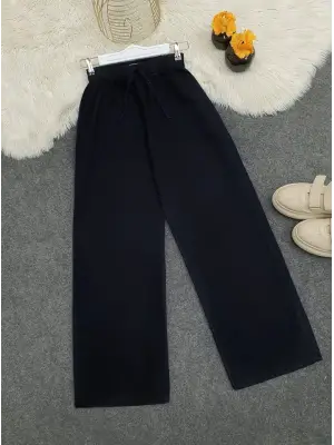 Bol Paça Beli Lastikli Bağcık Detaylı Kot Pantolon     -K.Laci