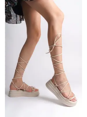 Omarı Rahat Tabanlı Bilekten Bağlamalı Topuklu Bayan Terlik - Krem