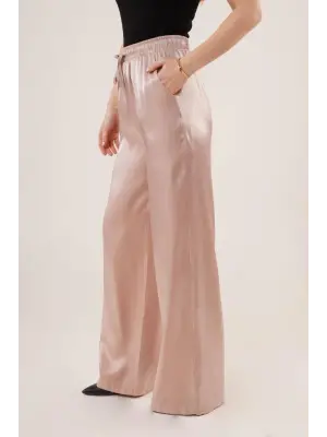 Parlak Görünümlü Cepli Bej Bol Paça Pantolon