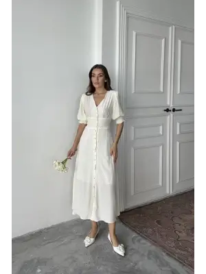 Omarı Sarı Elbise Arka Ve Bel Detaylarıyla Öne Çıkıyor