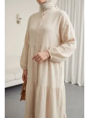 V Yaka Yarım Düğmeli Kolu Lastikli Parçalı Müslin Elbise -Taş