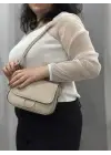 Omarı Şık Bej Renkli Cilt Dokulu Çanta