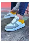 Omarı Şıklık ve Konforu Bir Arada Sunan Beyaz Sarı Erkek Casual Ayakkabı