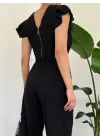 Omarı Siyah Fermuarlı Fırfırlı Tulum Modası