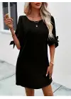 Kadın Kısa Kollu Kolu Bağlamalı Yakası Açık Janjan Elbise