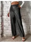 Kadın önden Fermuarlı Cepli Geniş Kesim Lame Deri Pantolon