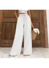 Keten bağcıklı beyaz pantolon