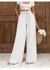 Keten bağcıklı beyaz pantolon