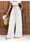 Keten bağcıklı beyaz pantolon