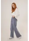 Omarı Bel Lastikli Paça Detaylarıyla Şık İndigo Pantolon