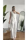 Kadın Beyaz Asimetrik Kesim Kruvaze Bağlamalı Yelek ,Pileli Plazzo Pantolon Takım