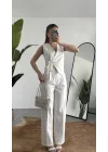Kadın Beyaz Asimetrik Kesim Kruvaze Bağlamalı Yelek ,Pileli Plazzo Pantolon Takım
