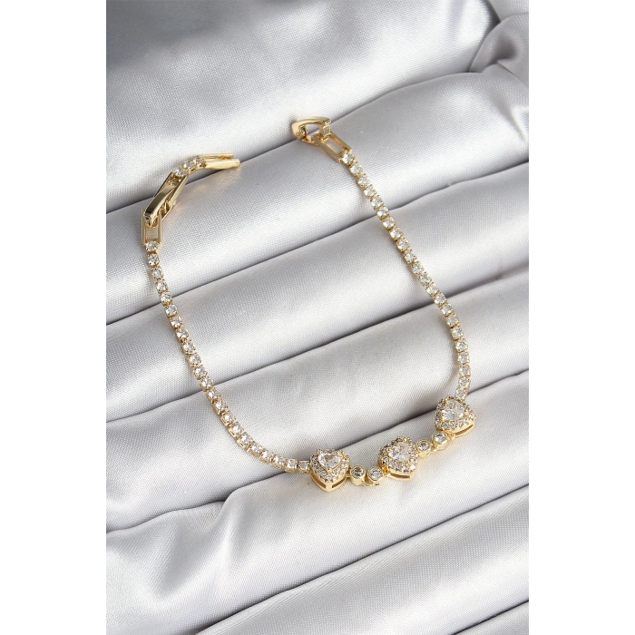 Pirinç Sıralı Kalp Figürlü Zirkon Taşlı Gold Renk Kadın Bileklik - TJ-BB6981