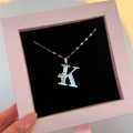 Çelik Melek Detaylı Silver K Harfli Kolye