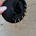 Gold Pembe Çiçek Detay 6 Lı Küpe Seti